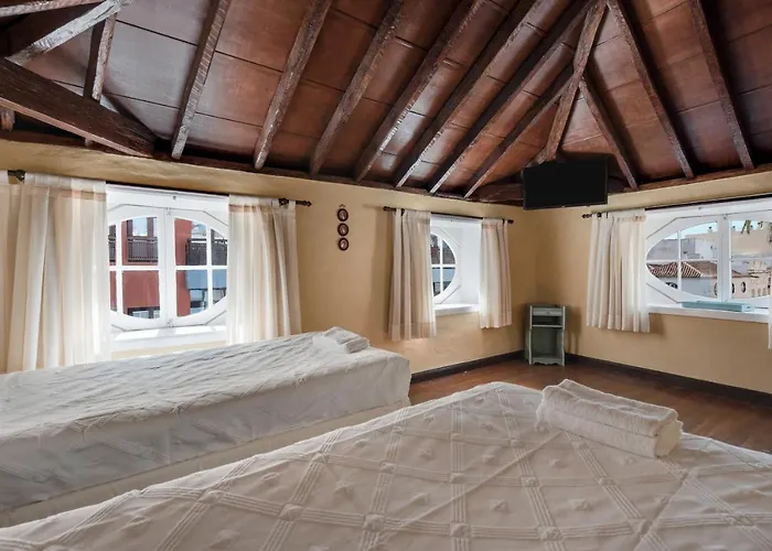 Апартаменты La Buhardilla De La Vicaria